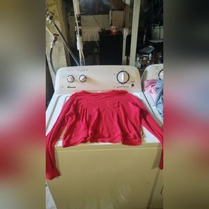 Women's red sweater with pocket on chest